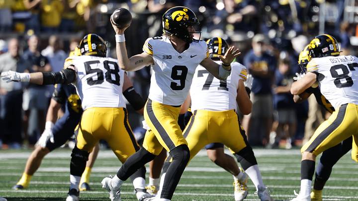 Sep 26, 2026; Ann Arbor, Michigan, USA;  Iowa Hawkeyes quarterback Hank Brown (9) passes against the Michigan Wolverines during the first half at Michigan Stadium.  Mandatory Credit: Rick Osentoski-Imagn Images