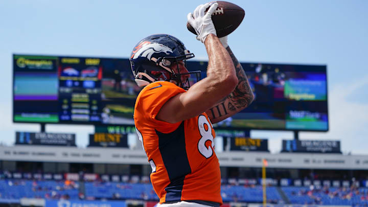 Aug 20, 2022; Orchard Park, New York, USA; Denver Broncos tight end Eric Saubert (82) catches a pass