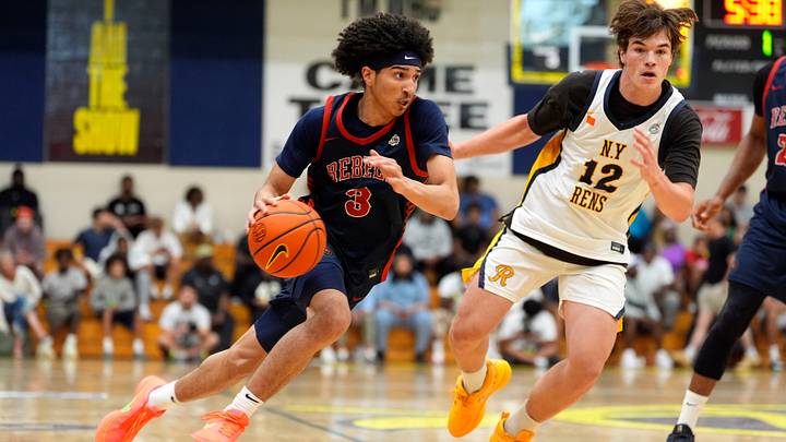Florida Rebels Cayden Daughtry (3) dribbles as NY Rens Bridgie McMillan (12) defends during the third day of the 2026 Nike EYBL Peach Jam at Riverview Park Activities Center in North Augusta, S.C., on Thursday, July 16, 2026. The NY Rens defeated the Florida Rebels 84-83.