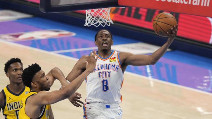 Jun 16, 2025; Oklahoma City, Oklahoma, USA; Oklahoma City Thunder forward Jalen Williams (8) shoots a layup against Indiana Pacers center Tony Bradley (middle) during the third quarter in Game 5 of the 2025 NBA Finals at Paycom Center. Mandatory Credit: Kyle Terada-Imagn Images Jun 16, 2025; Oklahoma City, Oklahoma, USA; Oklahoma City Thunder forward Jalen Williams (8) shoots a layup against Indiana Pacers center Tony Bradley (middle) during the third quarter in Game 5 of the 2025 NBA Finals at Paycom Center. Mandatory Credit: Kyle Terada-Imagn Images