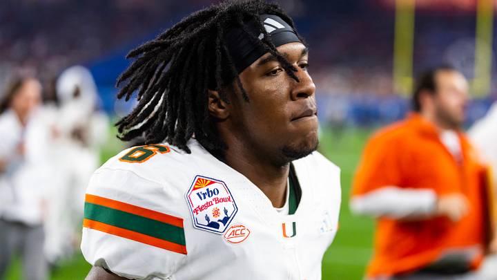 Jan 8, 2026; Glendale, AZ, USA; Miami Hurricanes defensive back Xavier Lucas (6) against the Mississippi Rebels during the 2026 Fiesta Bowl and semifinal game of the College Football Playoff at State Farm Stadium. Mandatory Credit: Mark J. Rebilas-Imagn Images
