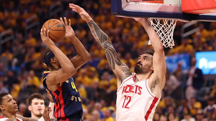 Apr 28, 2025; San Francisco, California, USA; Houston Rockets center Steven Adams (12) defends the shot by Golden State Warriors guard Moses Moody (4) during the second quarter of game four of the 2025 NBA Playoffs first round at Chase Center. Mandatory Credit: Kelley L Cox-Imagn Images