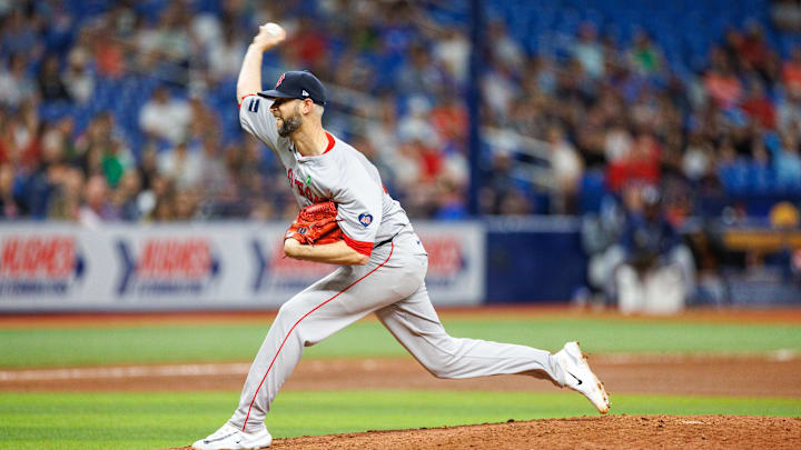 May 21, 2024; St. Petersburg, Florida, USA;  Boston Red Sox pitcher Chris Martin (55) throws a pitch against the Tampa Bay Rays in the eighth inning at Tropicana Field. Mandatory Credit: Nathan Ray Seebeck-Imagn Images