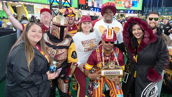 Apr 24, 2025; Green Bay, WI, USA;  Washington Commanders fans cheer before the first round of the 2025 NFL Draft at Lambeau Field. Mandatory Credit: Kirby Lee-Imagn Images
