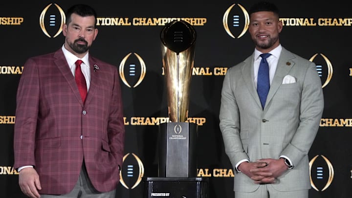 Jan 19, 2025; Atlanta, GA, USA; Ohio State Buckeyes head coach Ryan Day (left) and Notre Dame Fighting Irish head coach Marcus Freeman. Mandatory Credit: Kirby Lee-Imagn Images