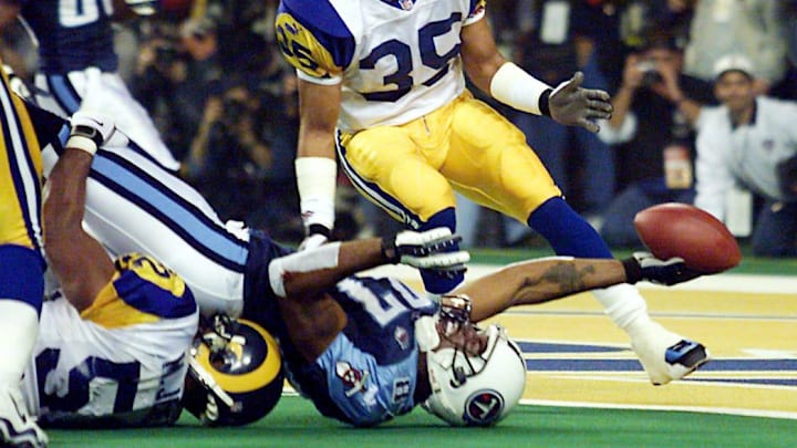 Tennessee Titans receiver Kevin Dyson stretches but in vain for a touchdown on the final play of Super Bowl XXXIV.