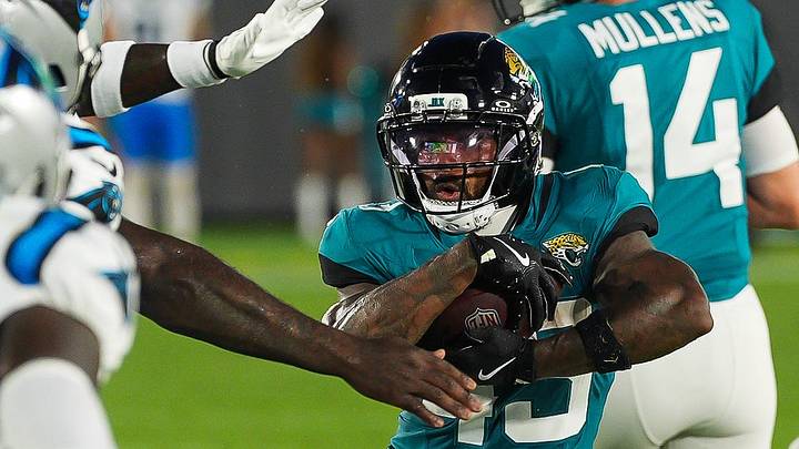 Jacksonville Jaguars running back Ameer Abdullah (43) eludes the Carolina defense during the first half against the Carolina Panthers at EverBank Stadium in the second preseason game on Friday night, August 21, 2026 in Jacksonville, Fla. [Doug Engle/Florida Times-Union]