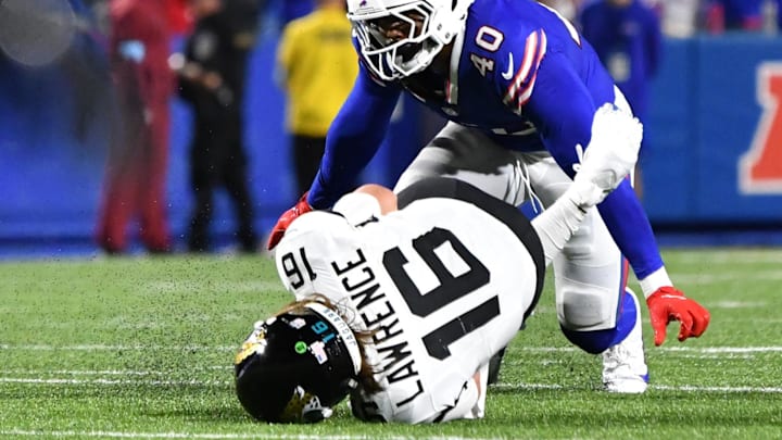 Sep 23, 2024; Orchard Park, New York, USA; Buffalo Bills linebacker Von Miller (40) sacks Jacksonville Jaguars quarterback Trevor Lawrence (16) in the fourth quarter at Highmark Stadium. Mandatory Credit: Mark Konezny-Imagn Images