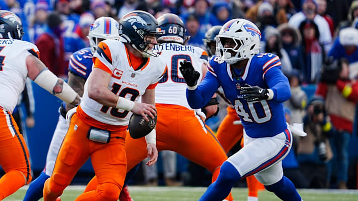 Buffalo Bills linebacker Von Miller (40) rushes towards Denver Broncos quarterback Bo Nix (10) 