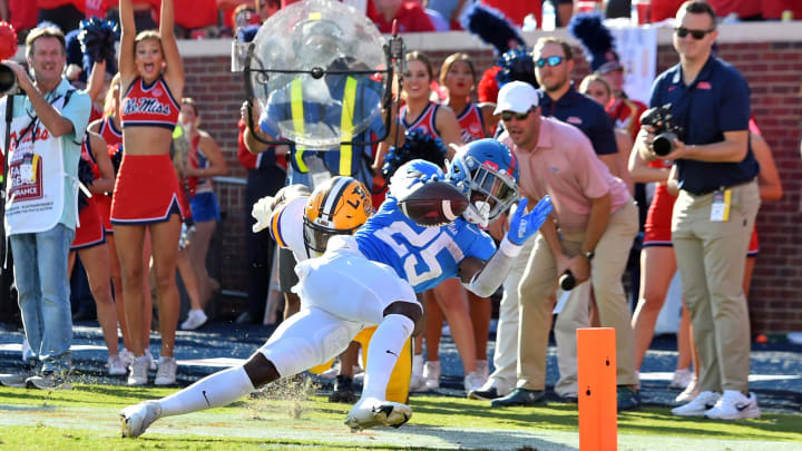 Oct 23, 2021; Oxford, Mississippi, USA; Mississippi Rebels running back Henry Parrish Jr. (25) reaches out during the first half against the LSU Tigers at Vaught-Hemingway Stadium. Mandatory Credit: Justin Ford-USA TODAY Sports