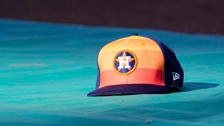 Apr 9, 2024; Kansas City, Missouri, USA; A general view of Houston Astros second base Jose Altuve (27) hat on the field during batting practice prior to a game against the Kansas City Royals at Kauffman Stadium. Mandatory Credit: Denny Medley-Imagn Images