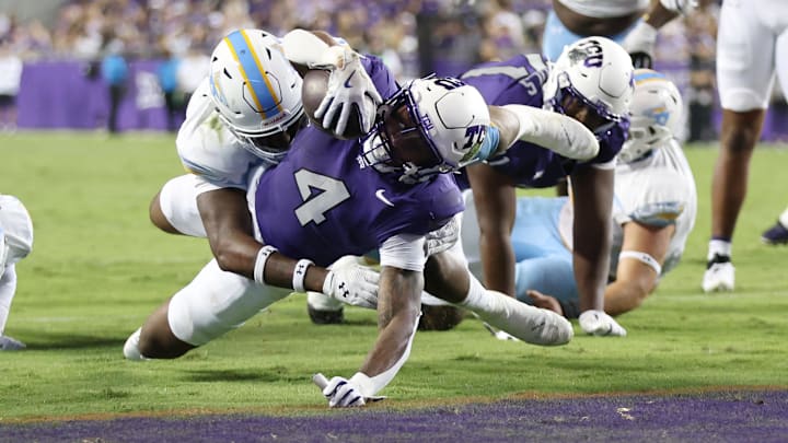 Sep 7, 2024; Fort Worth, Texas, USA; TCU Horned Frogs running back Cam Cook (4) scores a touchdown in the third quarter against the Long Island Sharks at Amon G. Carter Stadium. Mandatory Credit: Tim Heitman-Imagn Images