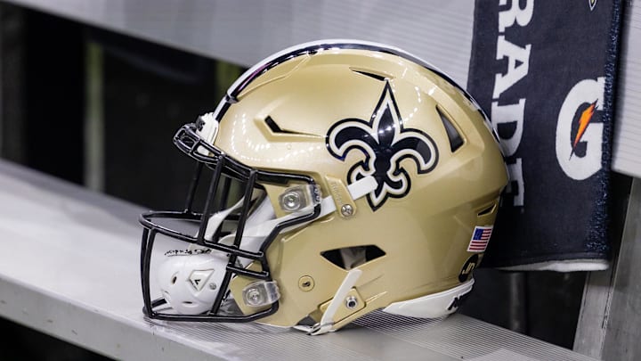 Nov 5, 2023; New Orleans, Louisiana, USA;  Detailed view of the New Orleans Saints helmet on the team bench against the Chicago Bears during the first half at the Caesars Superdome. Mandatory Credit: Stephen Lew-Imagn Images