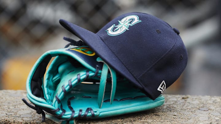 May 12, 2018; Detroit, MI, USA; Hat and glove of Seattle Mariners center fielder Dee Gordon (9) sits in dugout during the third inning against the Detroit Tigers at Comerica Park. Mandatory Credit: Rick Osentoski-Imagn Images