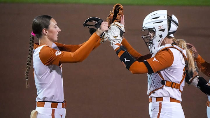 Texas Longhorns pitcher Teagan Kavan (17) greets catcher Reese Atwood (14) at the start of the game against Texas Tech on day one of the Bevo Classic at Red and Charline McCombs field on Friday, February. 14, 2025 in Austin. Texas Longhorns pitcher Teagan Kavan (17) greets catcher Reese Atwood (14) at the start of the game against Texas Tech on day one of the Bevo Classic at Red and Charline McCombs field on Friday, February. 14, 2025 in Austin.