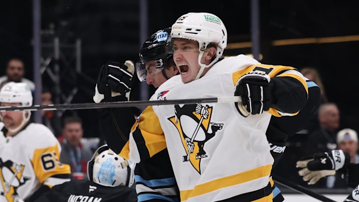 Jan 29, 2025; Salt Lake City, Utah, USA; Pittsburgh Penguins center Cody Glass reacts to a goal against the Utah Hockey Club by defenseman Erik Karlsson (not shown) during the third period at Delta Center. Mandatory Credit: Rob Gray-Imagn Images