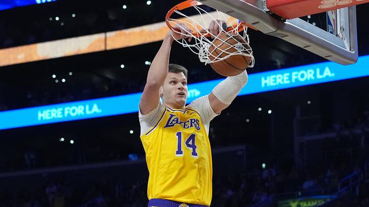 Oct 21, 2026; Los Angeles, California, USA; Los Angeles Lakers center Walker Kessler (14) dunks the ball against the Golden State Warriors in the first half at Crypto.com Arena. Mandatory Credit: Kirby Lee-Imagn Images Oct 21, 2026; Los Angeles, California, USA; Los Angeles Lakers center Walker Kessler (14) dunks the ball against the Golden State Warriors in the first half at Crypto.com Arena. Mandatory Credit: Kirby Lee-Imagn Images