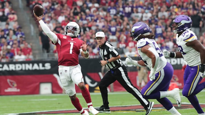 Arizona Cardinals quarterback Kyler Murray (1) throws the ball away under pressure against the Minnesota Vikings during the first quarter in Glendale, Ariz. Sept. 19, 2021.

Cardinals Vs Vikings
