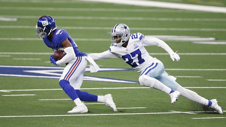 Oct 11, 2020; Arlington, Texas, USA; New York Giants wide receiver Darius Slayton (86) catches a pass against Dallas Cowboys cornerback Trevon Diggs (27) in the first quarter at AT&T Stadium. Oct 11, 2020; Arlington, Texas, USA; New York Giants wide receiver Darius Slayton (86) catches a pass against Dallas Cowboys cornerback Trevon Diggs (27) in the first quarter at AT&T Stadium.