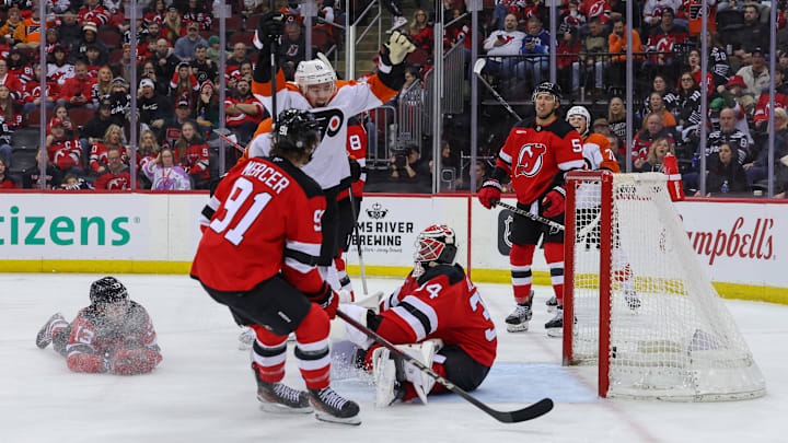 Jan 18, 2025; Newark, New Jersey, USA; Philadelphia Flyers right wing Bobby Brink (10) scores a goal on New Jersey Devils goaltender Jake Allen (34) during the third period at Prudential Center. Mandatory Credit: Ed Mulholland-Imagn Images Jan 18, 2025; Newark, New Jersey, USA; Philadelphia Flyers right wing Bobby Brink (10) scores a goal on New Jersey Devils goaltender Jake Allen (34) during the third period at Prudential Center. Mandatory Credit: Ed Mulholland-Imagn Images
