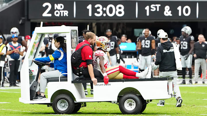 Aug 16, 2025; Paradise, Nevada, USA; San Francisco 49ers cornerback Jakob Robinson (49) is carted off the field after sustaining an injury against the Las Vegas Raiders during the second quarter at Allegiant Stadium. Mandatory Credit: Stephen R. Sylvanie-Imagn Images