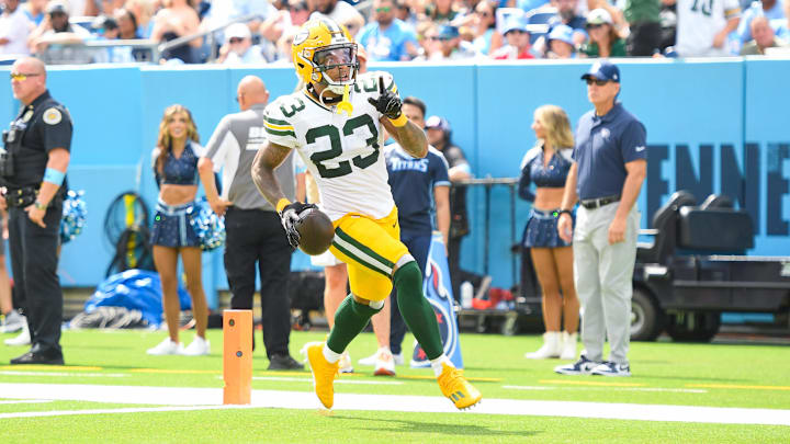 Sep 22, 2024; Nashville, Tennessee, USA;  Green Bay Packers cornerback Jaire Alexander (23) scores on a pick six thrown by Tennessee Titans Will Levis (8) during the first half at Nissan Stadium. Mandatory Credit: Steve Roberts-Imagn Images