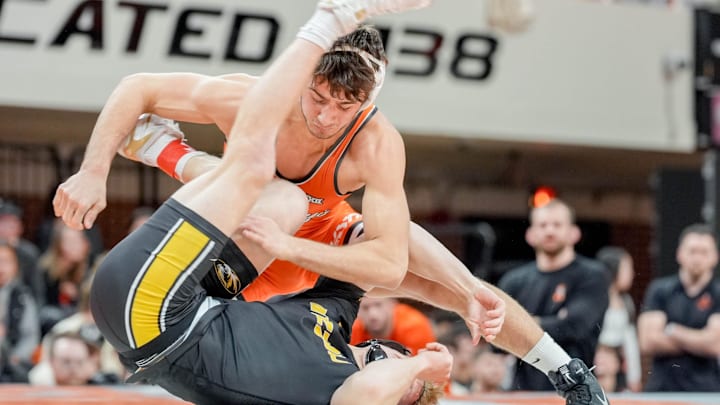 Oklahoma State’s Dean Hamiti Jr. gets near fall pointer on Jeremy Jakowitsch during an NCAA wrestling meet between Oklahoma State and Missouri at Gallagher-Iba Arena in Stillwater, Okla., on Sunday, Feb. 2, 2025. Oklahoma State’s Dean Hamiti Jr. gets near fall pointer on Jeremy Jakowitsch during an NCAA wrestling meet between Oklahoma State and Missouri at Gallagher-Iba Arena in Stillwater, Okla., on Sunday, Feb. 2, 2025.