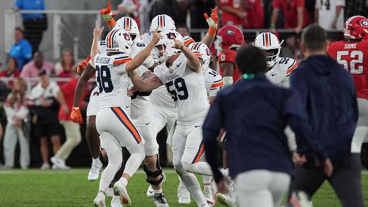 Oct 17, 2026; Athens, Georgia, USA;  Auburn kicker Alex McPherson (38) celebrates with teammates following a game-winning field goal during the fourth quarter against Georgia at Sanford Stadium.  Mandatory Credit: Dale Zanine-Imagn Images
