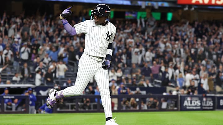 Oct 7, 2024; Bronx, New York, USA; New York Yankees third base Jazz Chisholm Jr. (13) reacts after hitting a home run against the Kansas City Royals in the ninth inning during game two of the ALDS for the 2024 MLB Playoffs at Yankee Stadium. Mandatory Credit: Vincent Carchietta-Imagn Images