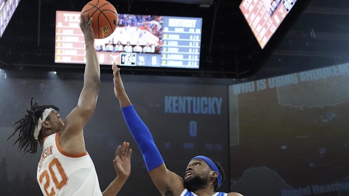 Feb 15, 2025; Austin, Texas, USA; Texas Longhorns guard Tre Johnson (20) shoots over Kentucky Wildcats forward Ansley Almonor (15) during the first half at Moody Center. Mandatory Credit: Scott Wachter-Imagn Images