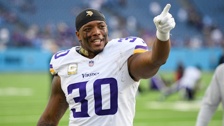 Nov 17, 2024; Nashville, Tennessee, USA;  Minnesota Vikings fullback C.J. Ham (30) points to the crowd as he walks off the field against the Tennessee Titans during the second half at Nissan Stadium. Mandatory Credit: Steve Roberts-Imagn Images
