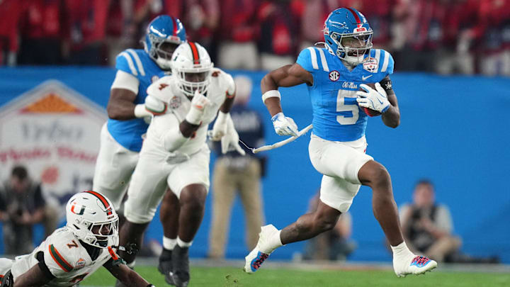 Ole Miss Rebels running back Kewan Lacy (5) scores on a 73-yard touchdown run against the Miami Hurricanes