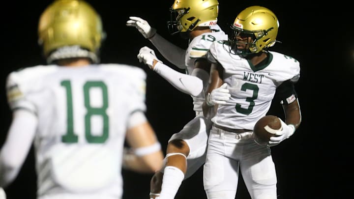 Iowa City West’s Julian Manson (3) celebrates after scoring a touchdown against Iowa City Liberty Friday, Aug. 30, 2024 in North Liberty, Iowa.