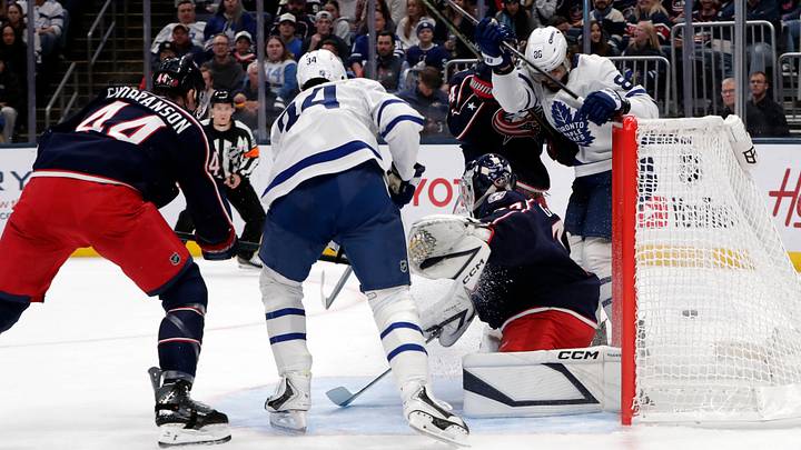 Oct 20, 2026; Columbus, Ohio, USA; Toronto Maple Leafs right wing Kirill Marchenko (86) deflects the puck past Columbus Blue Jackets goalie Jet Greaves (73) for a goal during the first period at Nationwide Arena. Mandatory Credit: Russell LaBounty-Imagn Images Oct 20, 2026; Columbus, Ohio, USA; Toronto Maple Leafs right wing Kirill Marchenko (86) deflects the puck past Columbus Blue Jackets goalie Jet Greaves (73) for a goal during the first period at Nationwide Arena. Mandatory Credit: Russell LaBounty-Imagn Images