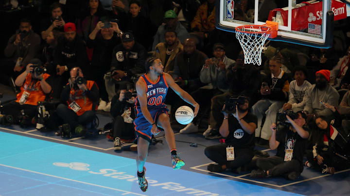 Feb 17, 2024; Indianapolis, IN, USA; New York Knicks forward Jacob Toppin (3) competes in the AT&T Slam Dunk Contest during NBA All Star Saturday Night at Lucas Oil Stadium. Mandatory Credit: Trevor Ruszkowski-Imagn Images