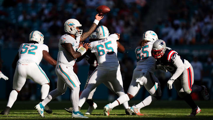Miami Dolphins quarterback Tua Tagovailoa (1) attempts a pass against the New England Patriots during the second half at Hard Rock Stadium. Miami Dolphins quarterback Tua Tagovailoa (1) attempts a pass against the New England Patriots during the second half at Hard Rock Stadium.