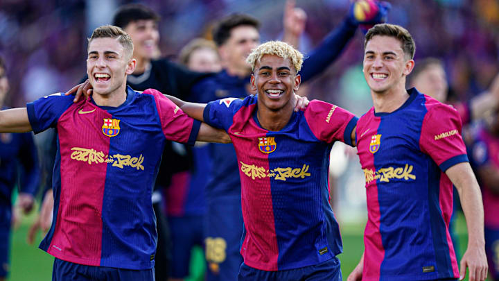 La Masia talents Fermín López (left), Lamine Yamal (middled) and Gavi celebrate Barcelona's win vs. Real Madrid.