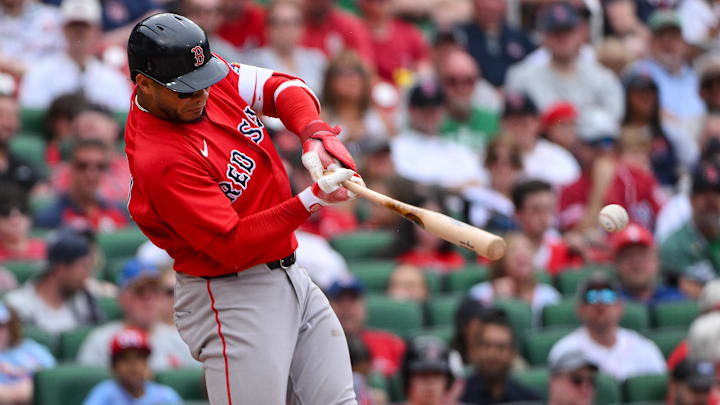Apr 12, 2026; St. Louis, Missouri, USA; Boston Red Sox first baseman Willson Contreras (40) hits a single against the St. Louis Cardinals during the third inning at Busch Stadium. Mandatory Credit: Jeff Curry-Imagn Images