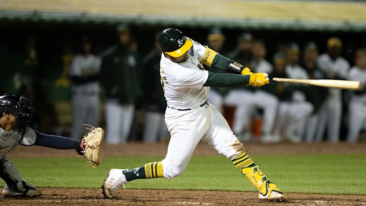 Mar 29, 2024; Oakland, California, USA; Oakland Athletics catcher Shea Langeliers (23) breaks his