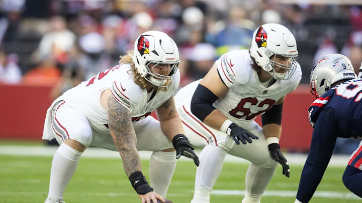 Dec 15, 2024; Glendale, Arizona, USA; Arizona Cardinals guard Hjalte Froholdt (72) and center Evan Brown (62) against the New England Patriots at State Farm Stadium. Mandatory Credit: Mark J. Rebilas-Imagn Images Dec 15, 2024; Glendale, Arizona, USA; Arizona Cardinals guard Hjalte Froholdt (72) and center Evan Brown (62) against the New England Patriots at State Farm Stadium. Mandatory Credit: Mark J. Rebilas-Imagn Images