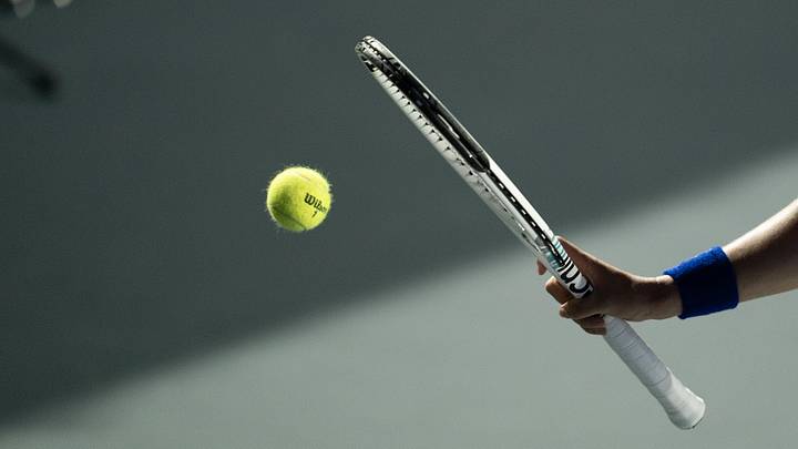Oct 30, 2023; Cancun, Mexico;  Iga Swiatek (POL) catching a ball with her racket during her match against Marketa Vondrousova (CZE) on day two of the GNP Saguaros WTA Finals Cancun. Mandatory Credit: Susan Mullane-Imagn Images