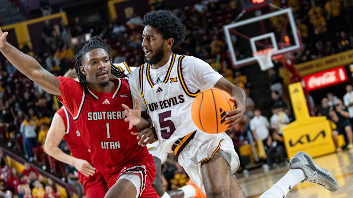 Arizona State Sun Devils Moe Odum (5) runs with the ball against Southern Utah Thunderbirds Elijah Duval (1) during a game at Desert Financial Arena in Tempe on Nov. 4, 2025.