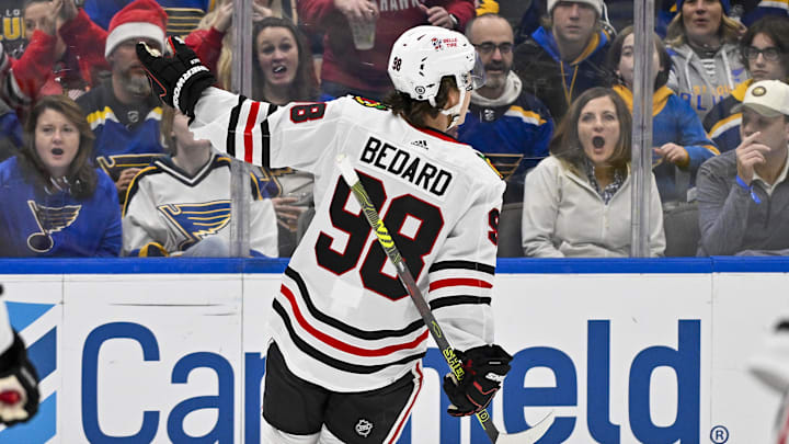 Dec 23, 2023; St. Louis, Missouri, USA;  Chicago Blackhawks center Connor Bedard (98) reacts after