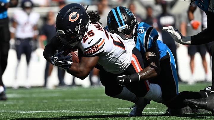 Sep 13, 2026; Charlotte, North Carolina, USA; Chicago Bears running back Kyle Monangai (25) is tackled by Carolina Panthers safety Nick Scott (21) in the second half at Bank of America Stadium. Mandatory Credit: Bob Donnan-Imagn Images Sep 13, 2026; Charlotte, North Carolina, USA; Chicago Bears running back Kyle Monangai (25) is tackled by Carolina Panthers safety Nick Scott (21) in the second half at Bank of America Stadium. Mandatory Credit: Bob Donnan-Imagn Images