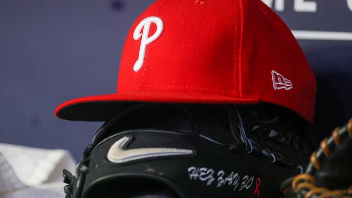 May 26, 2023; Atlanta, Georgia, USA; A detailed view of a Philadelphia Phillies hat and glove on the bench against the Atlanta Braves in the seventh inning at Truist Park. May 26, 2023; Atlanta, Georgia, USA; A detailed view of a Philadelphia Phillies hat and glove on the bench against the Atlanta Braves in the seventh inning at Truist Park.