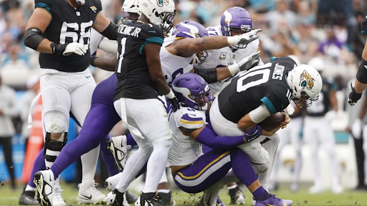 Nov 10, 2024; Jacksonville, Florida, USA; Minnesota Vikings linebacker Ivan Pace Jr. (0) sacks Jacksonville Jaguars quarterback Mac Jones (10) during the second quarter at EverBank Stadium. Mandatory Credit: Morgan Tencza-Imagn Images