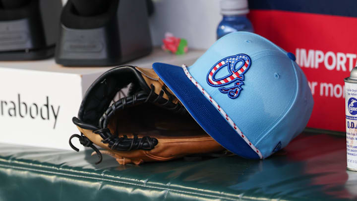Jul 4, 2025; Atlanta, Georgia, USA; A detailed view of the Baltimore Orioles 4th of July hat in the dugout against the Atlanta Braves in the third inning at Truist Park. 