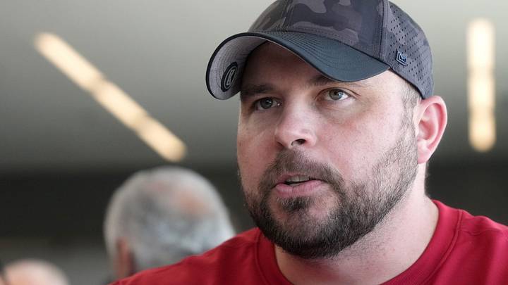 Arizona Cardinals offensive line coach Klayton Adams speaks with the media as he is introduced as a new hire with fellow coaches at the Cardinals facility. Arizona Cardinals offensive line coach Klayton Adams speaks with the media as he is introduced as a new hire with fellow coaches at the Cardinals facility.