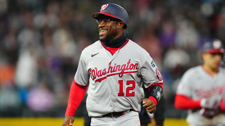 Washington Nationals first base coach Eric Young Jr. reacts during a game against the Colorado Rockies on April 8, 2023, at Coors Field.