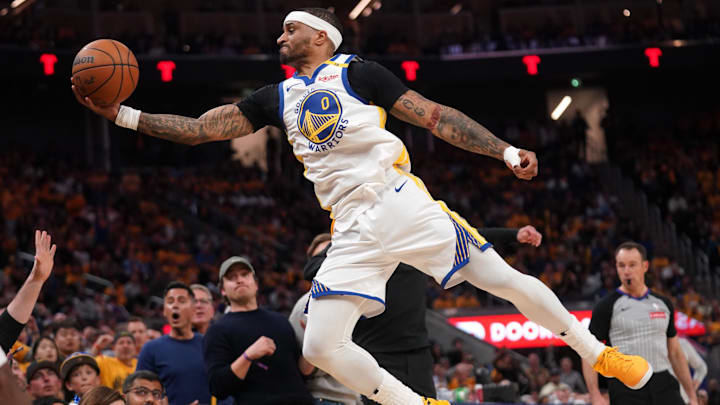 Apr 15, 2025; San Francisco, California, USA; Golden State Warriors guard Gary Payton II (0) saves the ball from going out of bounds against the Memphis Grizzlies in the fourth quarter at the Chase Center. Mandatory Credit: Cary Edmondson-Imagn Images Apr 15, 2025; San Francisco, California, USA; Golden State Warriors guard Gary Payton II (0) saves the ball from going out of bounds against the Memphis Grizzlies in the fourth quarter at the Chase Center. Mandatory Credit: Cary Edmondson-Imagn Images